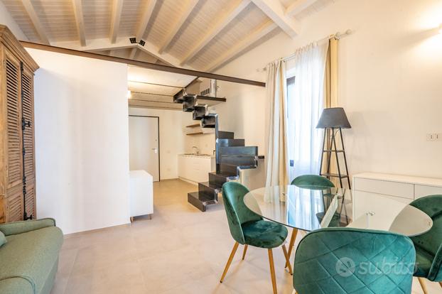 Loft arredato con veranda attrezzata