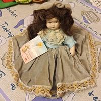 Bambola in porcellana biscuit 