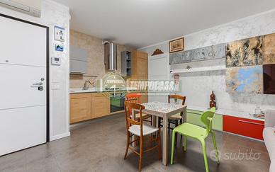 BILOCALE CON TERRAZZO A CARNATE ALTA