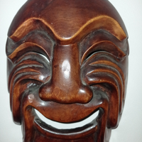 Maschera sorridente etnica