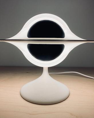 Lampada da tavolo buco nero