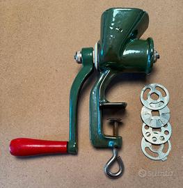 Tritacarne manuale vintage con 4 dischi