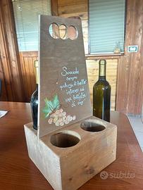 Portabottiglie artigianali in legno.