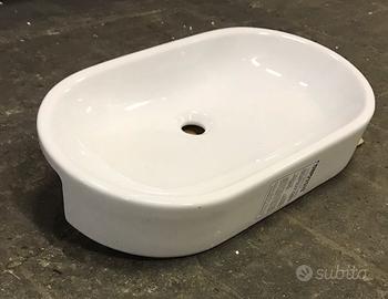 Lavabo ovale in ceramica bianca