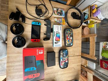 Nintendo Switch + 256GB SD e tanti accessori