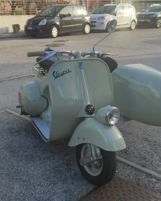 Vespa con sidecar