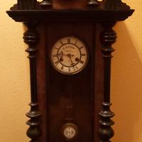 Antico orologio da parete