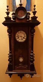 Antico orologio da parete