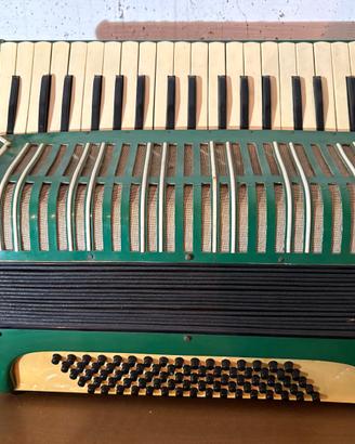 Fisarmonica vintage verde a tastiera