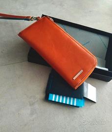 pochette Piquadro pelle arancione 