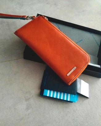 pochette Piquadro pelle arancione 