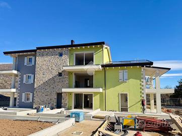 VILLA A SCHIERA A COSTERMANO