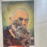 Rosario con santino di Padre Pio