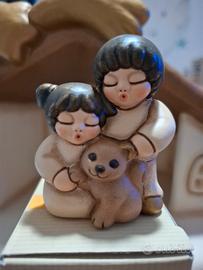 Presepe Thun coppia bimbi con gatto champagne 