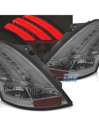 FANALI SUZUKI SWIFT V 10-17 NUOVA STRISCIA LED FUM