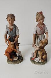 Coppia statuine Capodimonte bambino e bambina