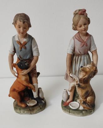 Coppia statuine Capodimonte bambino e bambina