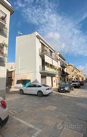 Appartamenti e locale commerciale