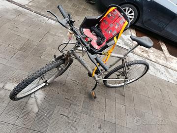 Bici uomo con seggiolino bimbo