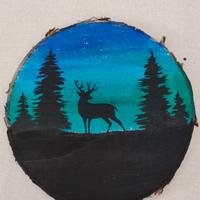 Cerchio di legno decorato a mano