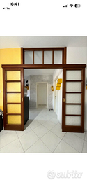 Porta scorrevole due ante