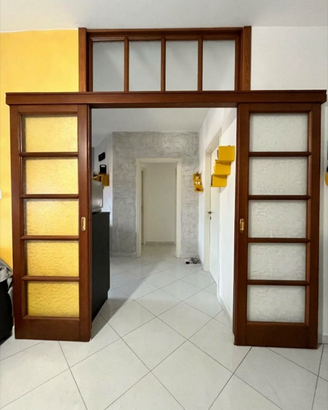Porta scorrevole due ante