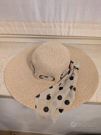 Cappello di paglia a tesa larga estivo con fiocco 
