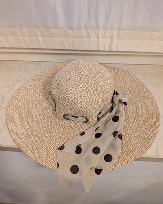 Cappello di paglia a tesa larga estivo con fiocco 