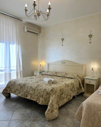 Camera da letto stile Costa Smeralda