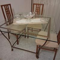 Tavolo in vetro e ferro battuto