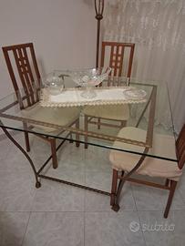 Tavolo in vetro e ferro battuto