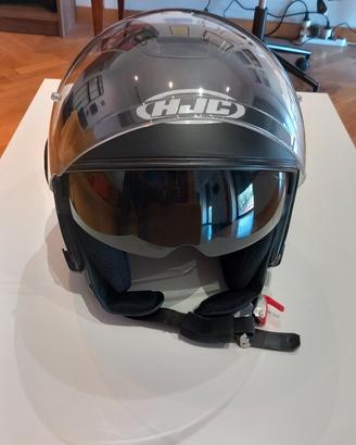 Casco HJC con occhiali da sole nuovo.