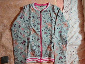 felpa garzata con zip e farfalle