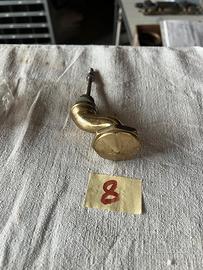 Pomolo porta decentrato