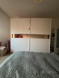 Armadio ante scorrevoli con specchio