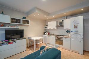 BILOCALE CON GIARDINO PRIVATO E BOX