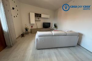 Appartamento con tre camere, garage doppio e canti