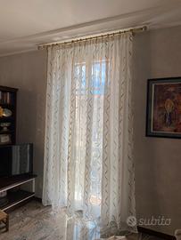 Tenda con motivi elicoidali color crema e bronzo