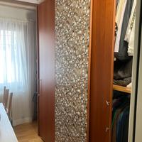 Armadio in legno  porte scorrevoli e cassetti