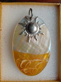 Ciondolo del Sole in argento.
