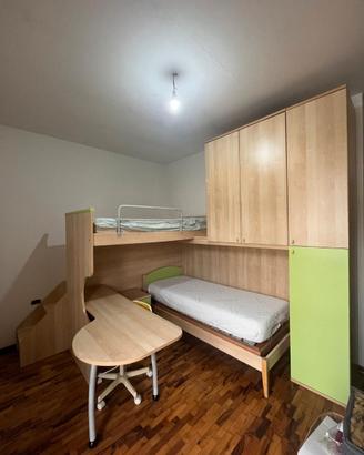 camera da letto con letto a castello
