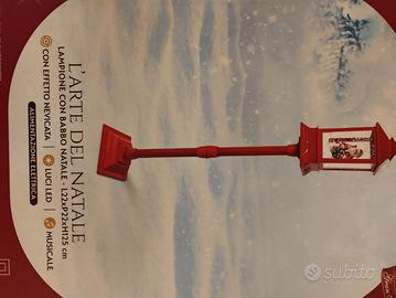 lampione rosso di natale con musica