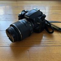 Nikon D3100 + obiettivo 18-55 mm