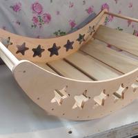 Dondolo montessoriano in legno