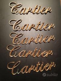 Logo originale Cartier in ottone fuso