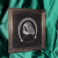 Ricamo a filo antico in cornice