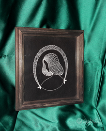 Ricamo a filo antico in cornice