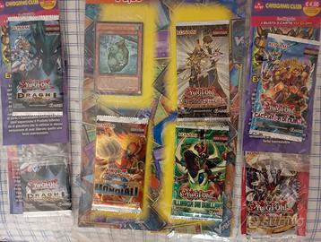 7 pacchetti di Yu-Gi-Oh sigillati+ 3 carte promo 