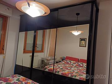 camera da letto nera lucida