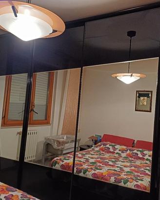 camera da letto nera lucida